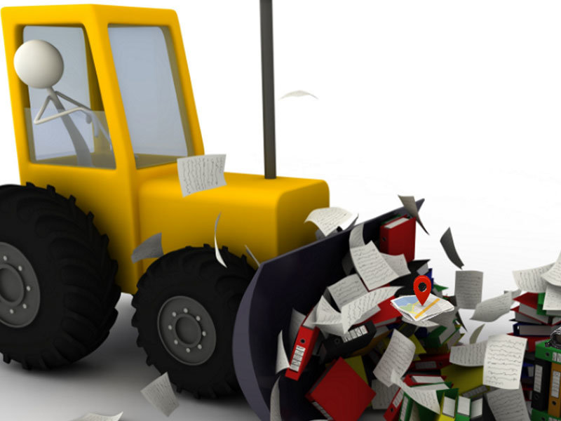 Traktor fjerner papir